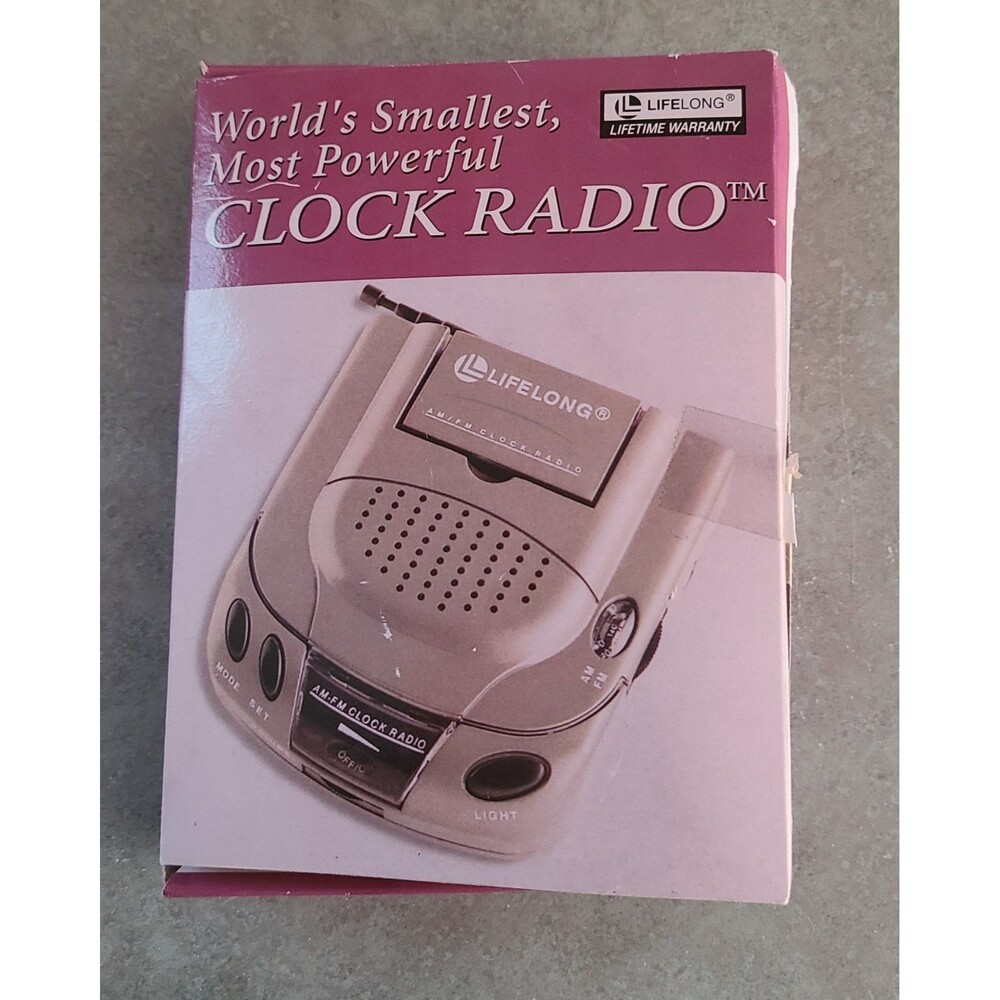 World's Smallest Most Powerful Clock Radio Handheld AM/FM LifeLong Lifetime